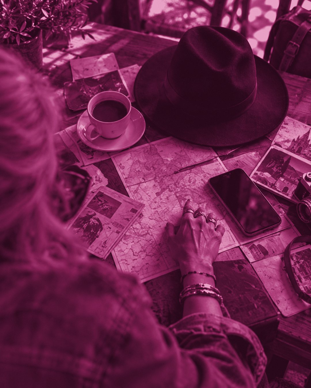 Grace Uncommon planning at a table with a map